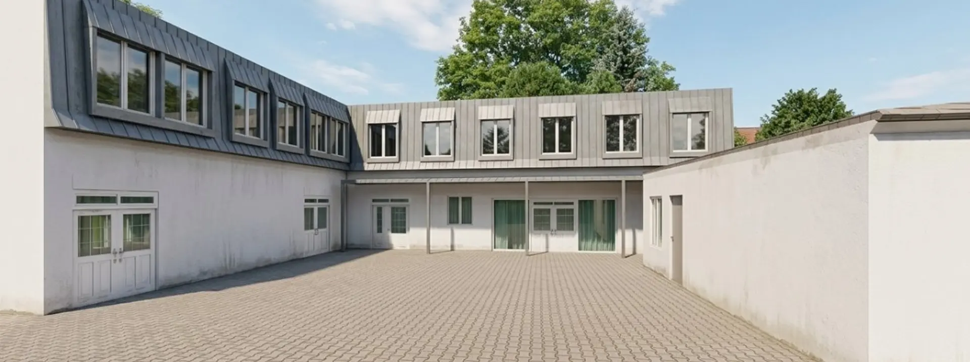 Innenhof mit Aufstockung in Holzbauweise